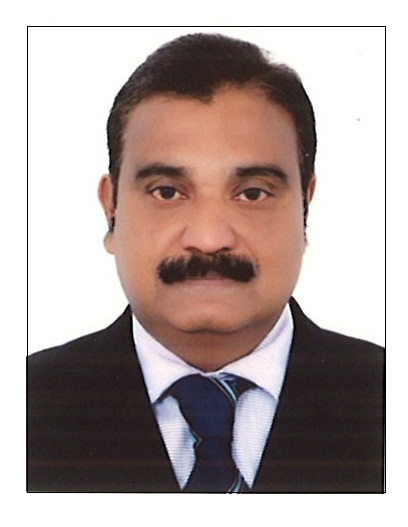 Dr Thomas Joseph Thoomkuzhy, M.Com, LL.B  